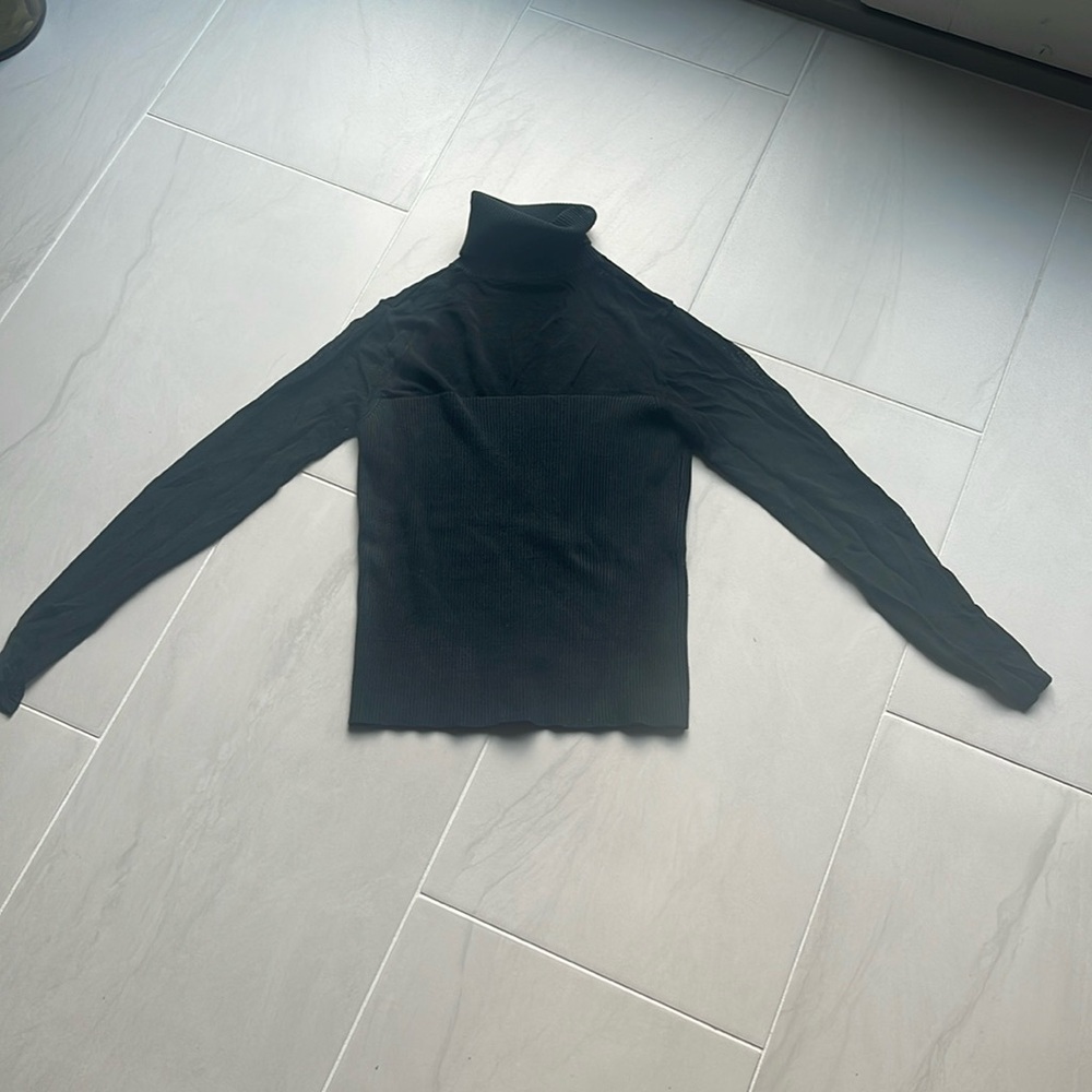 Woman’s turtleneck top